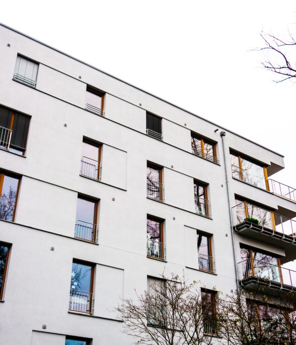 white-modern-apartment-house-at-autumn-with-tree-w-2026-01-09-13-11-39-utc1